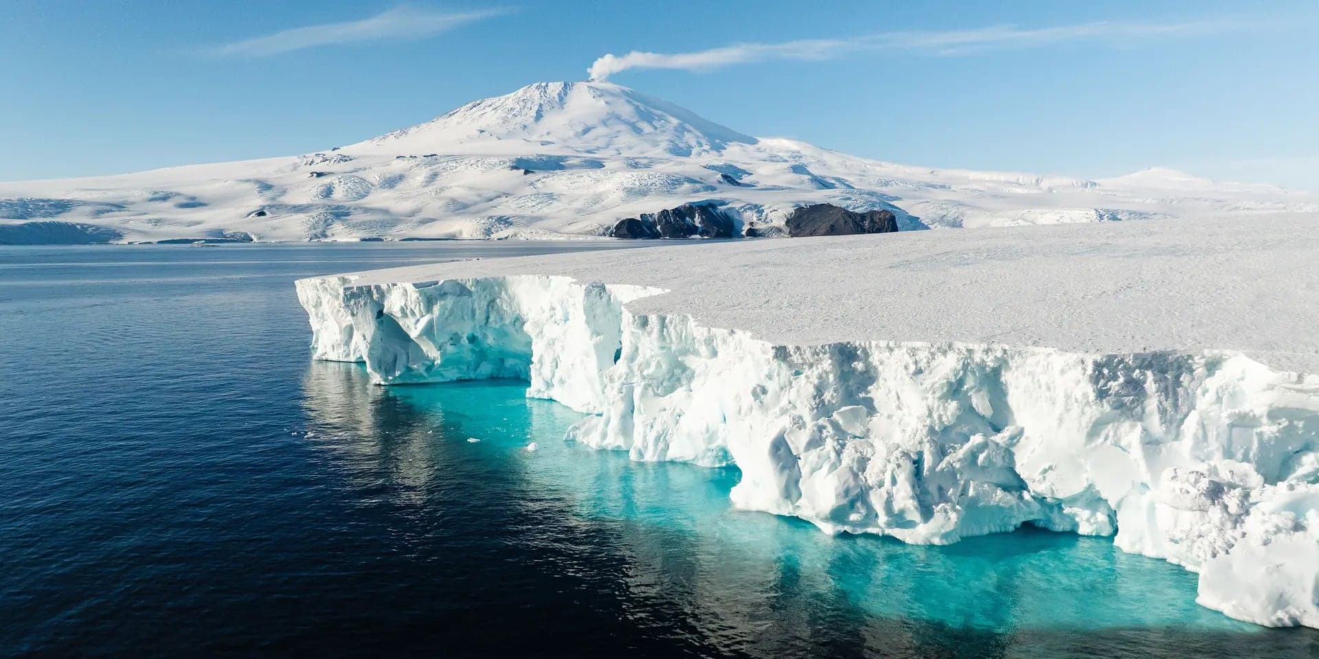 Pack ice and a steaming Mount Erebus over the Ross Sea
