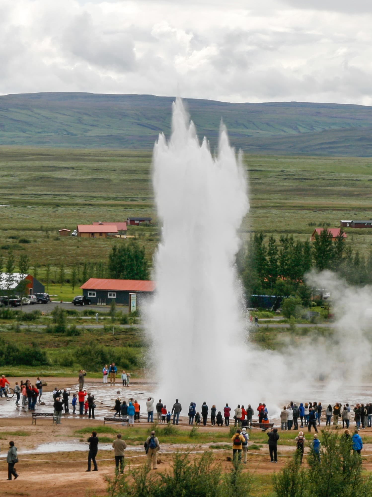Strokkur erupting against a winter sky